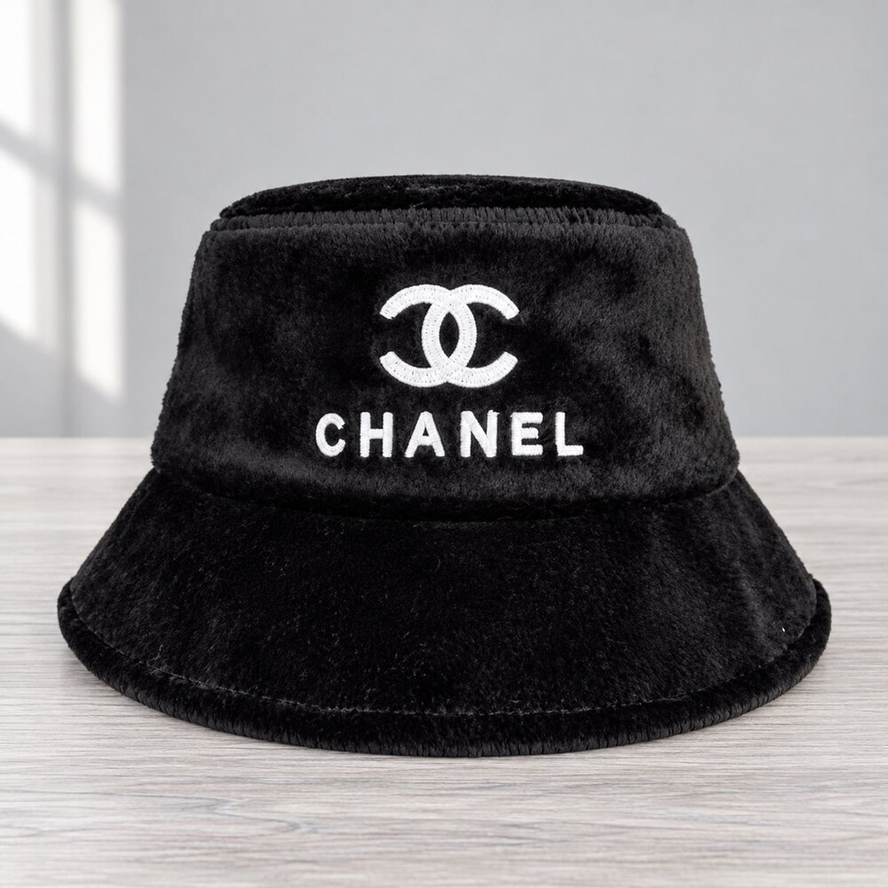 CHANEL Black Shearling Logo Bucket Hat